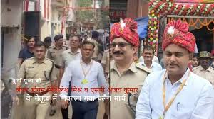 The district administration organised a flag march to ensure peaceful and harmonious Durga Puja celebrations.